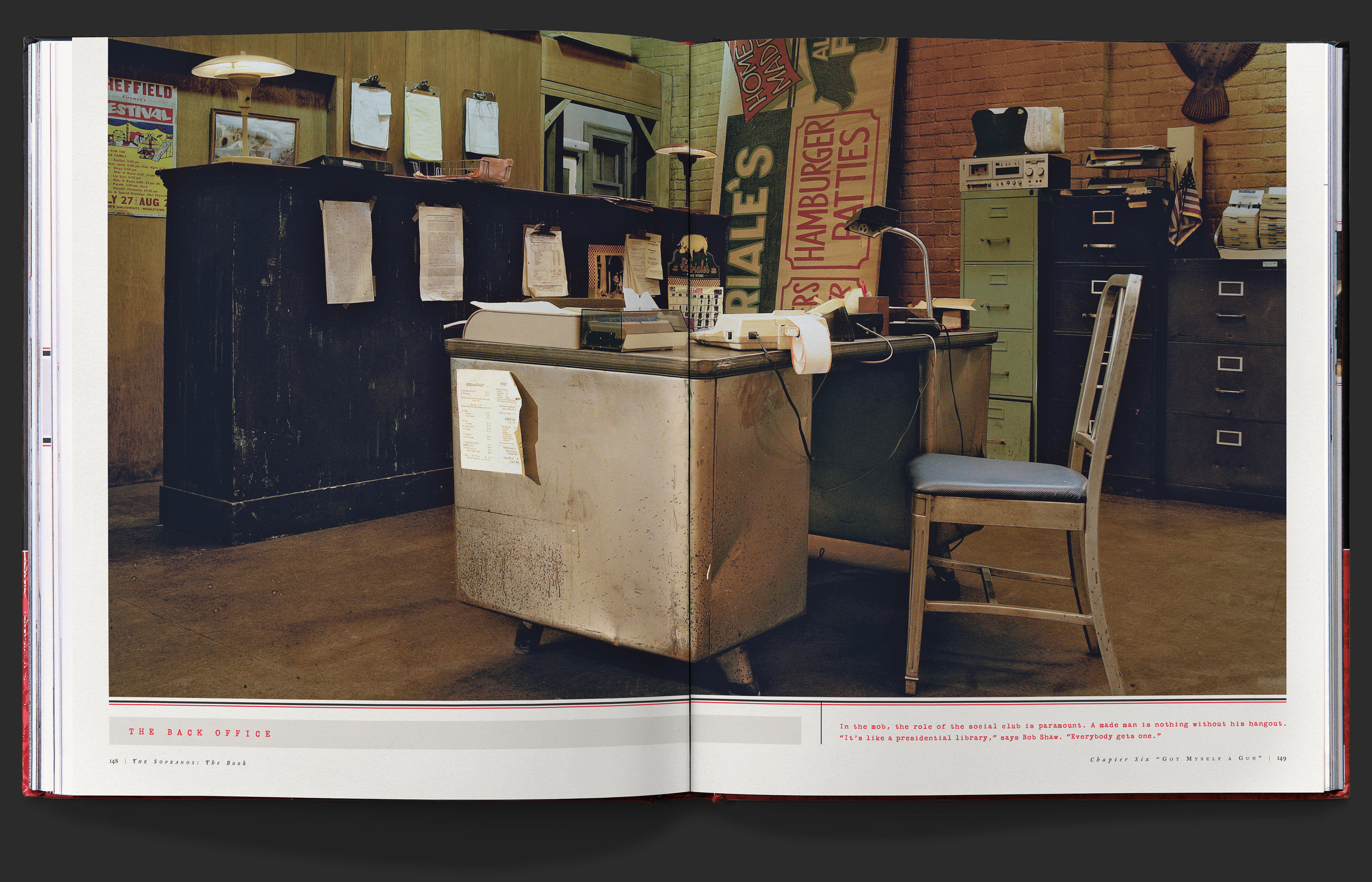 Two page photo of the back office at Satriale’s pork store, with a small caption running underneath.