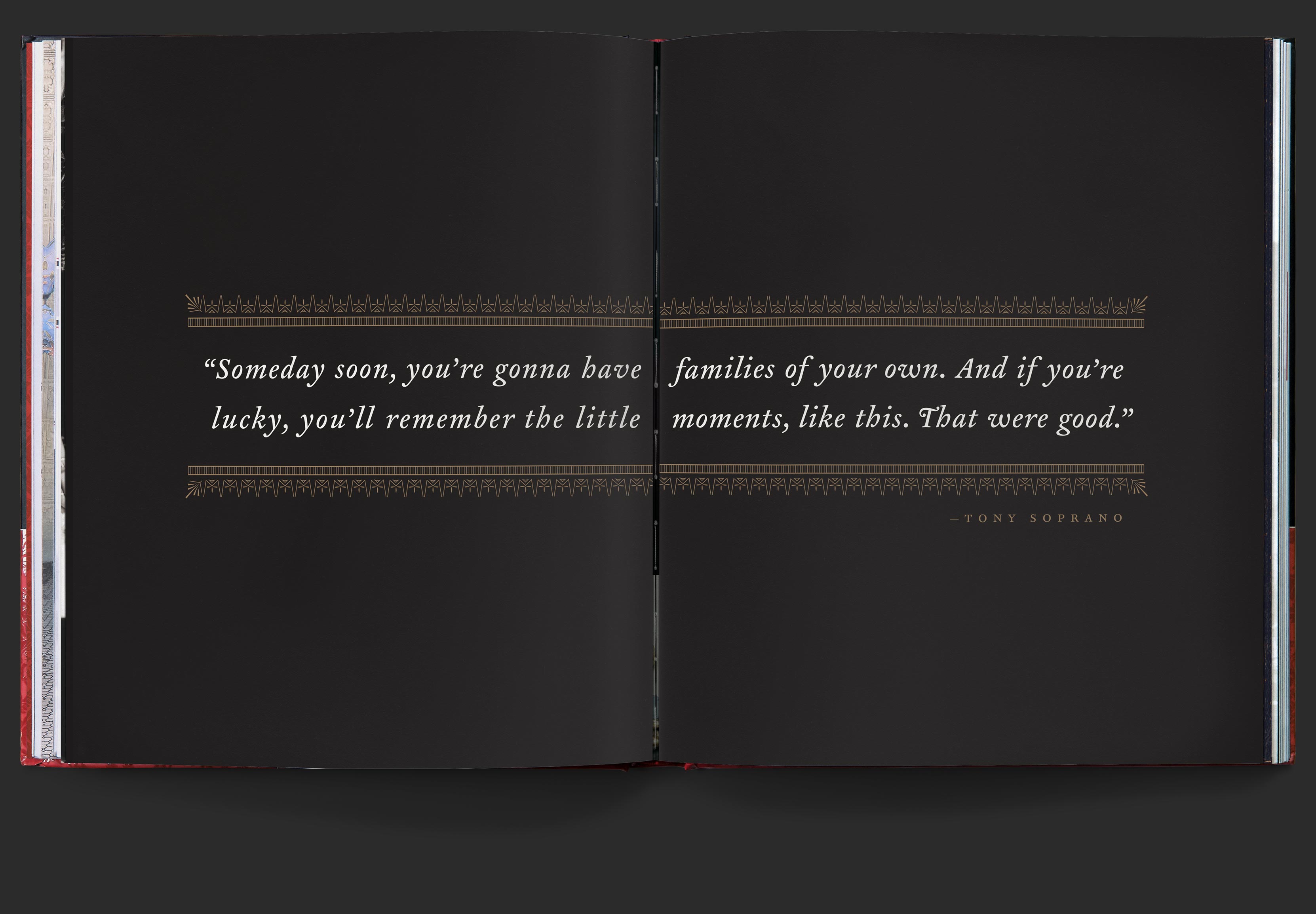 Quote from tony soprano spanning a simple spread, printed in white and gold on black background, which unfolds into a gatefold to reveal a photograph.